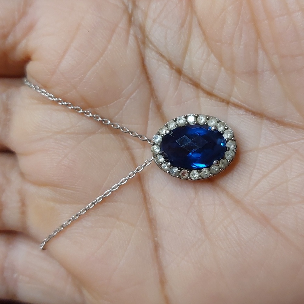 Blue Sapphire And Halo White Sapphire Oval Pendant Sterling Silver Necklace